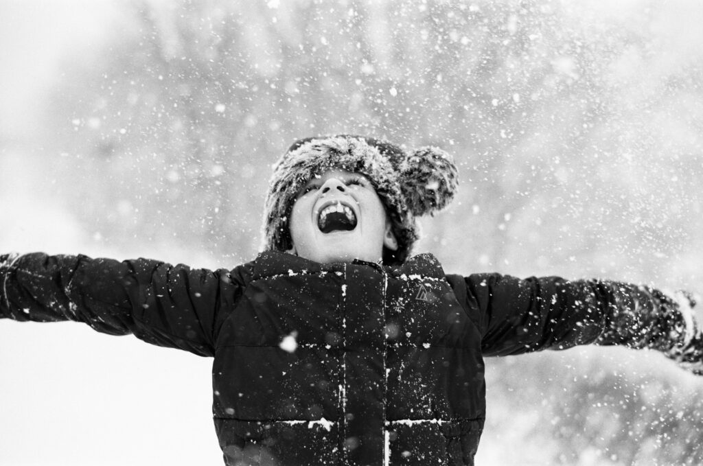 Girl standing in blizzard