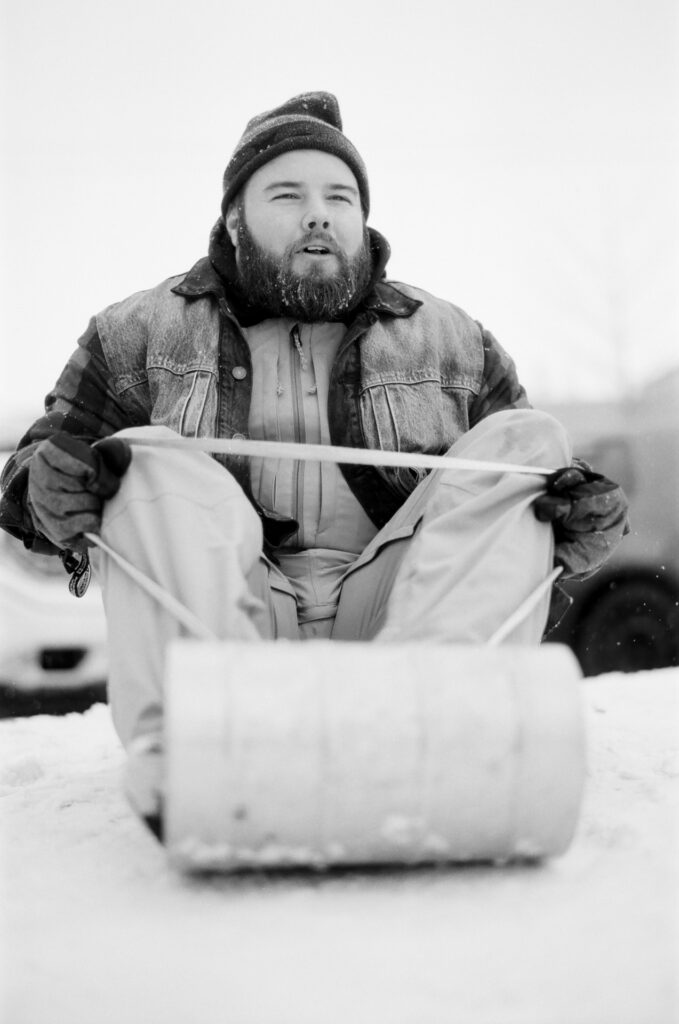Man on toboggan