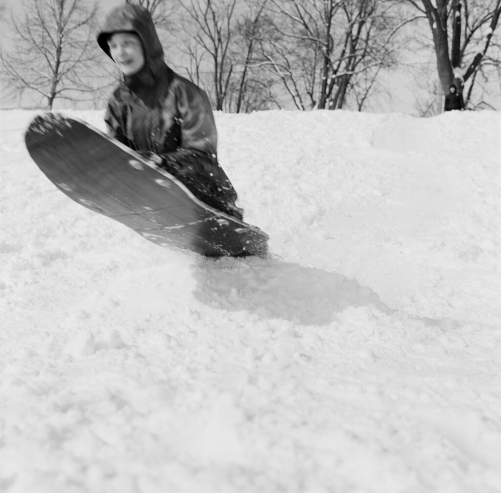 Boy Sledding