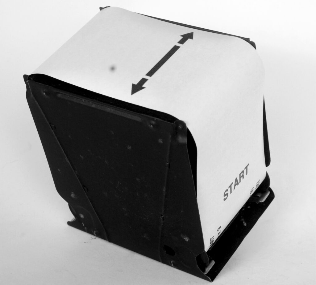 The inner section showing the distance the backing has to cover on loading.