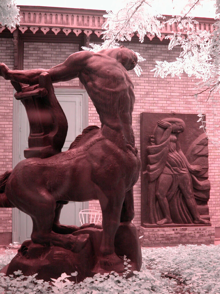 “Dying Centaur” (with detail from “Meditation of Apollo and the Muses” in background)