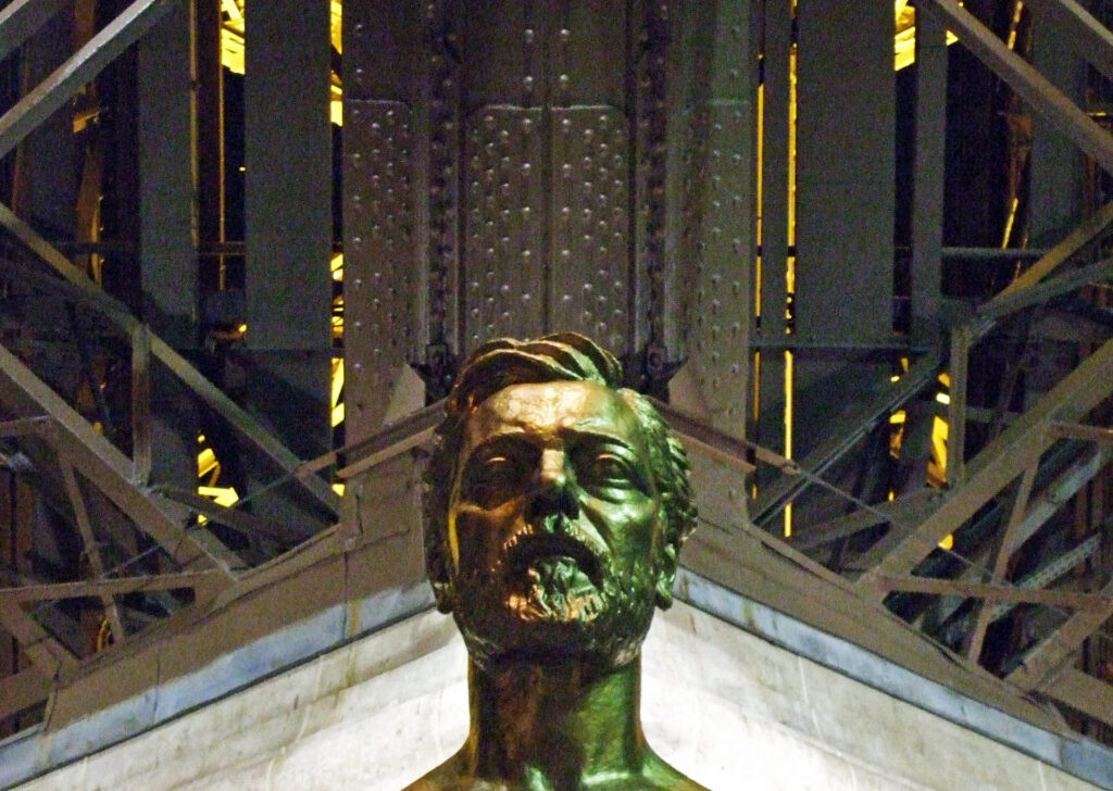 Antoine Bourdelle's gilt bronze bust of Gustave Eiffel, installed at the foot of the Eiffel Tower